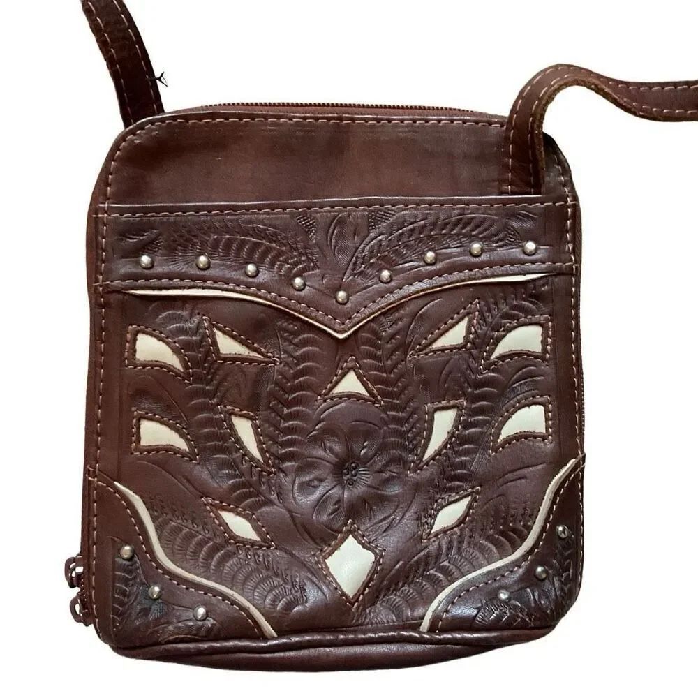 Boutique 100% brown leather with floral design and cream accentscrossbody bag